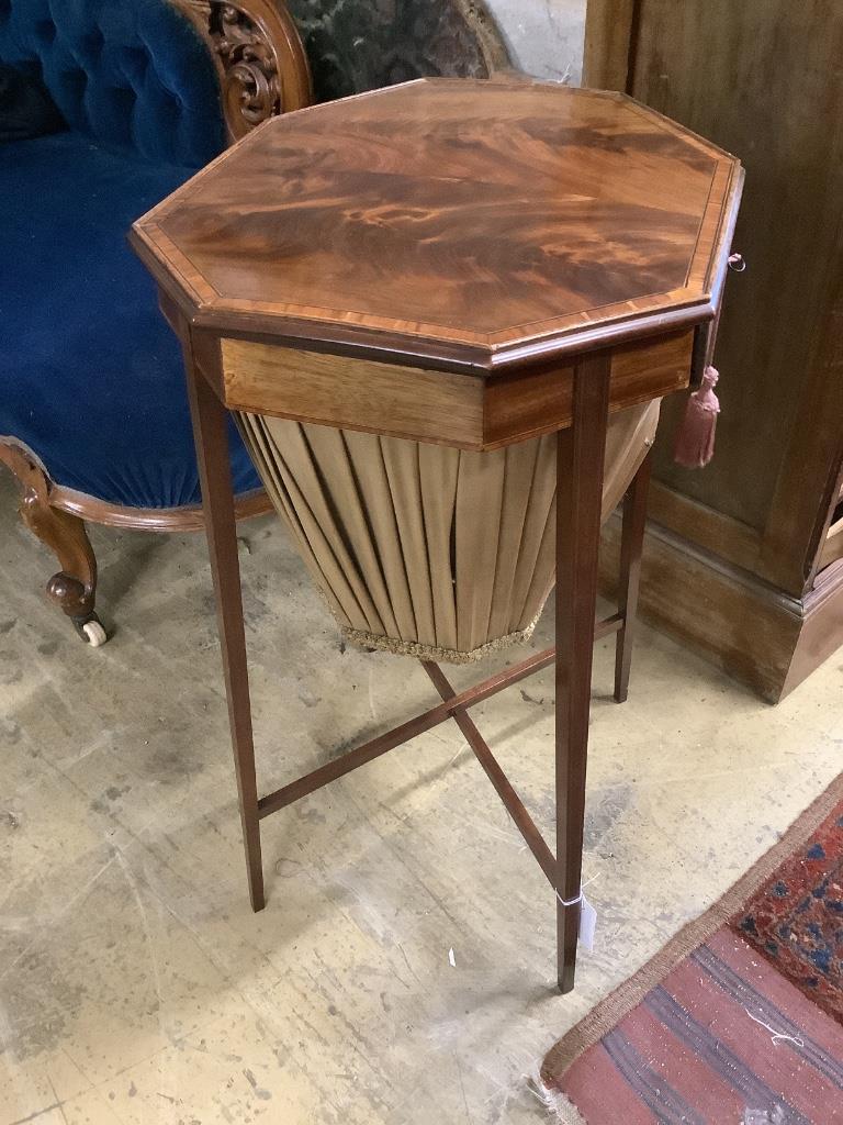 A George III banded mahogany octagonal topped work table